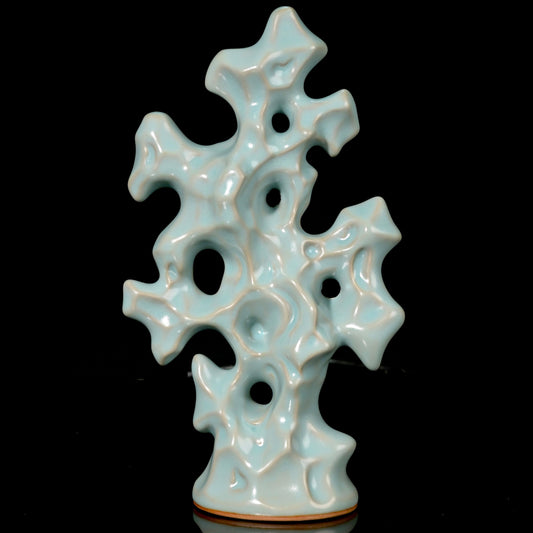 Ru Ware sky-blue glazed Scholar's Rock ceramic sculpture against dark background