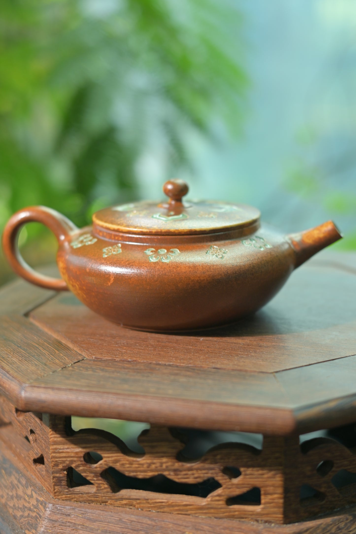 Song Dynasty style celadon teapot with rustic ash glaze and auspicious floral carvings
