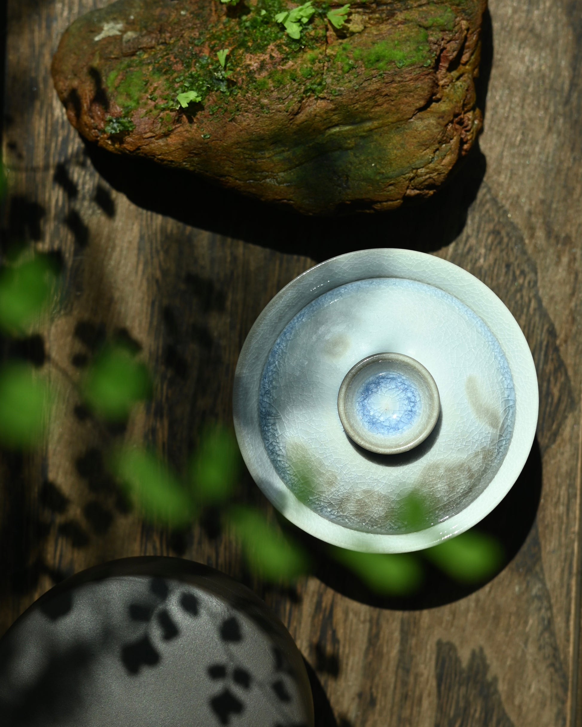 Compact 80ml gaiwan with blue-white crystalline glaze, handmade in Jingdezhen using traditional techniques
