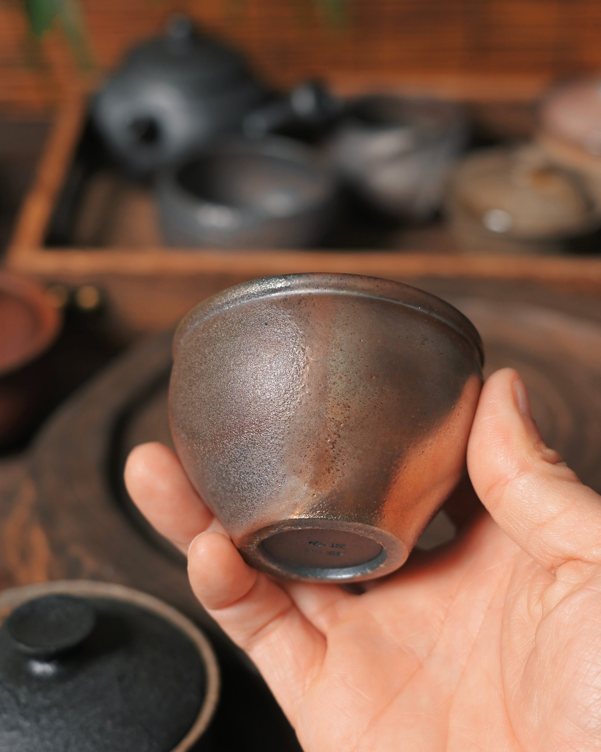 Bell-like resonance quality achieved through high-density iron-rich clay composition