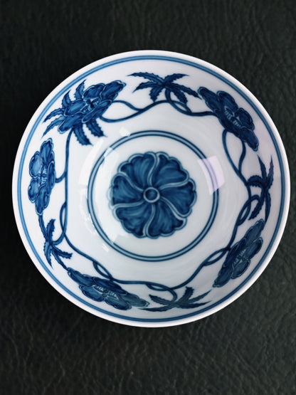 Jingdezhen handmade thin-walled master cup in Ming-style blue and white with underglaze lotus scroll pattern, crafted from fine kaolin porcelain with brilliant glaze and vivid cobalt tones, inspired by Ming Twelve Palaces bowls.