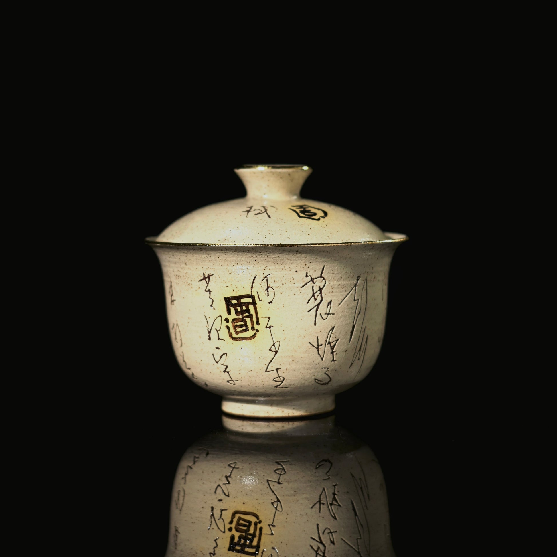 Kohiki gaiwan hand-painted with Su Shi's "Ding Feng Bo" poem in cursive script on white slip