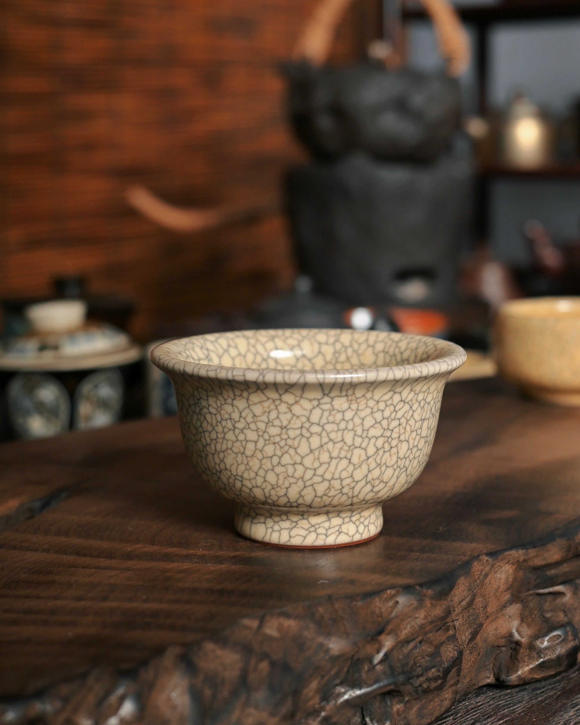 Celadon glaze surface with jade-like translucency and beige glaze characteristic of Zhejiang porcelain