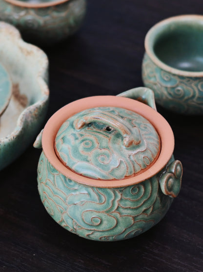 Complete travel tea set: hand-sculpted cloud-design zisha pot, large spill-proof tray, and nesting cups for easy portability.
