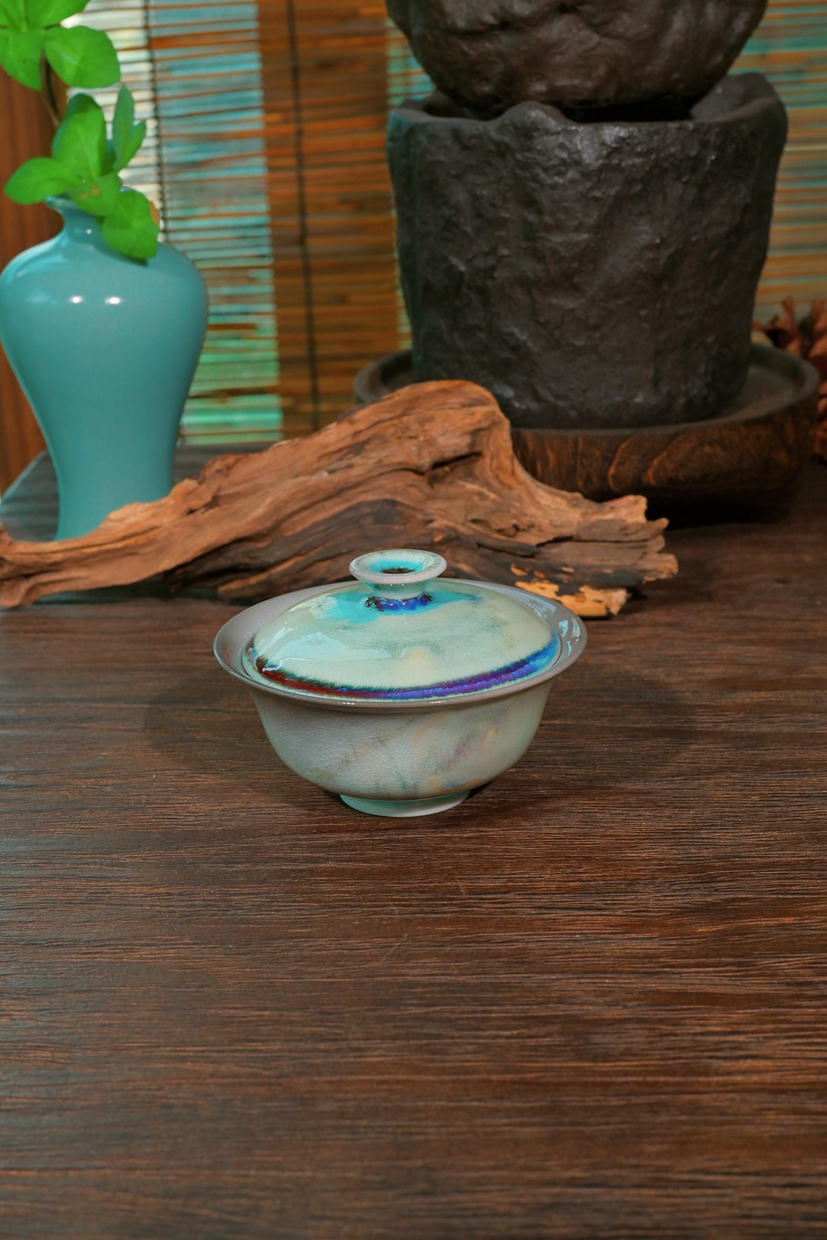 Handcrafted 120ml wood-fired tea bowl featuring wide-flared heat-safe rim and creamy glaze finish