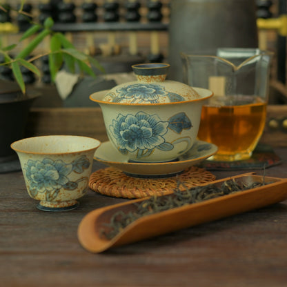 Old Clay Blue-and-White Volcanic Stone Caramel Glaze Tea Cup (45ml) with Hand-Painted Flora Design