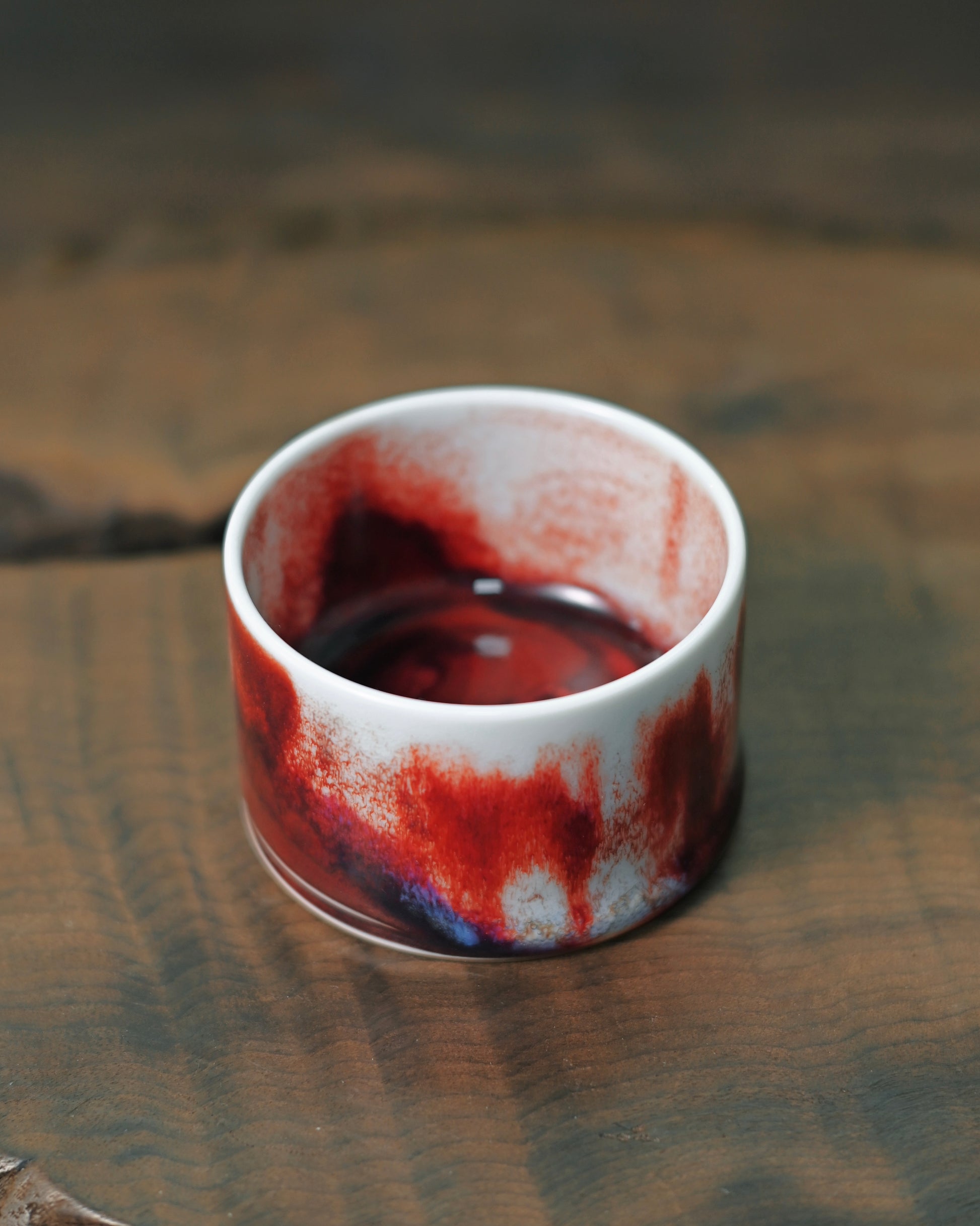 Substantial thumb-ring tea cup designed for balanced grip and grounded tea ritual