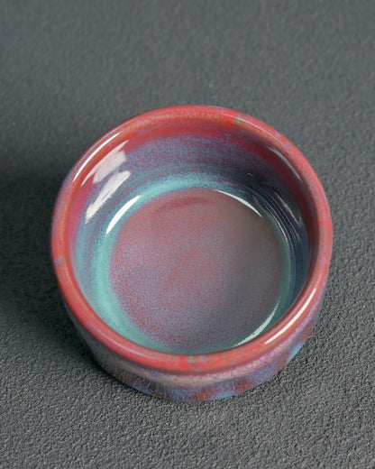 Chinese Jun ware handcrafted in Shenhou with glaze transformed, features flowing lavender/oxblood colors, wide mouth design, and 180ml capacity for oolong and dark tea ceremonies.