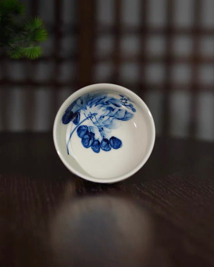 Porcelain rim detail showing clear transparent glaze over hand-painted floral brushwork