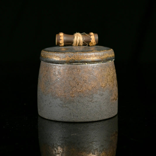 Elegant vintage gilded Chinese small stoneware tea caddy with intricate detailing.
