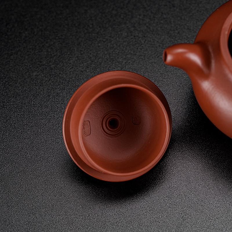 Classic lotus seed silhouette teapot with elegantly curved spout and ergonomic C-shaped handle