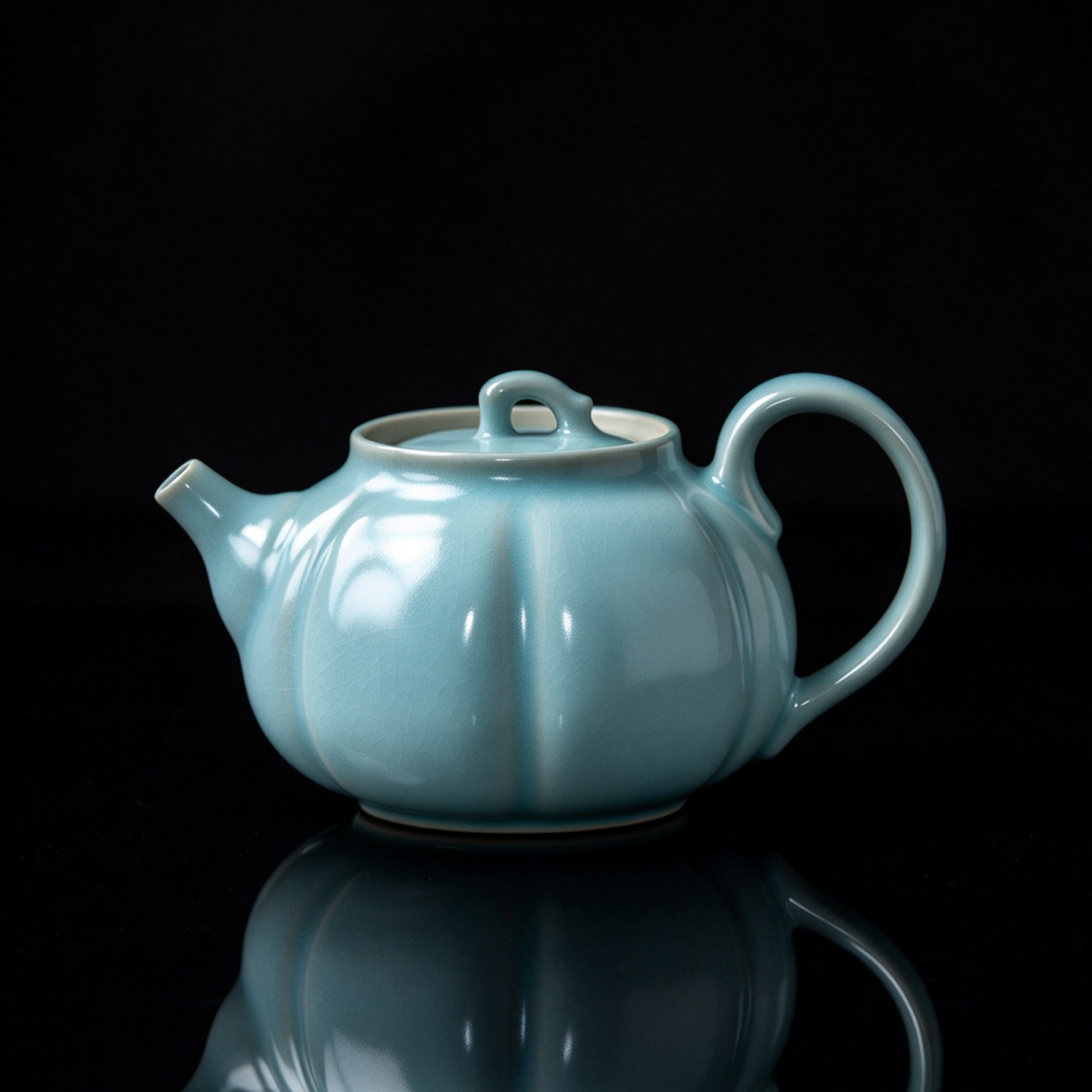 Artisanal 200ml sky-blue Ru porcelain teapot designed for loose leaf tea expansion