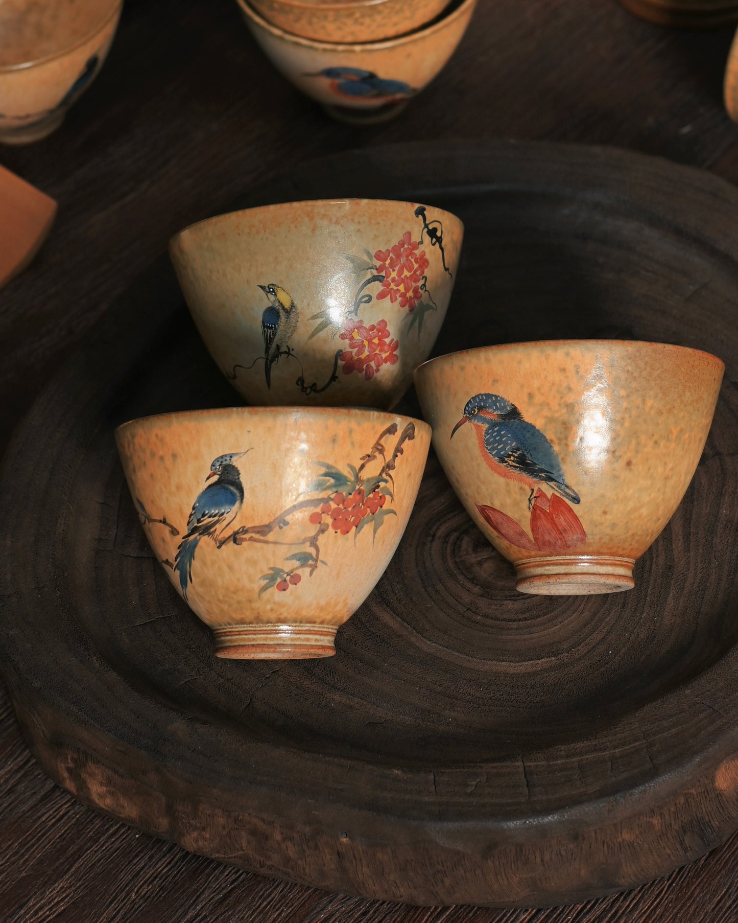 Traditional Chinese ink painting style depicting delicate avian and botanical motifs