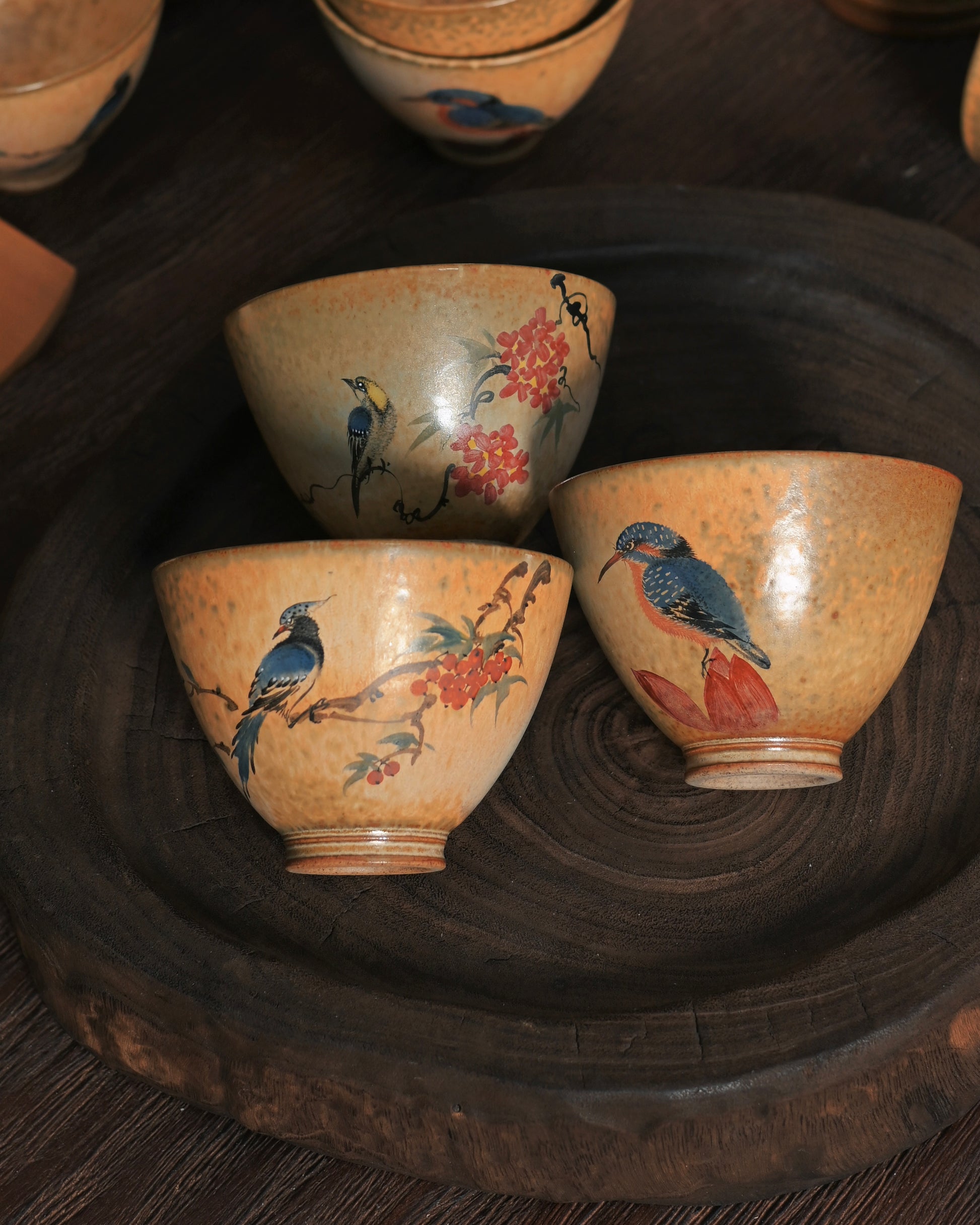Traditional Chinese ink painting style depicting delicate avian and botanical motifs