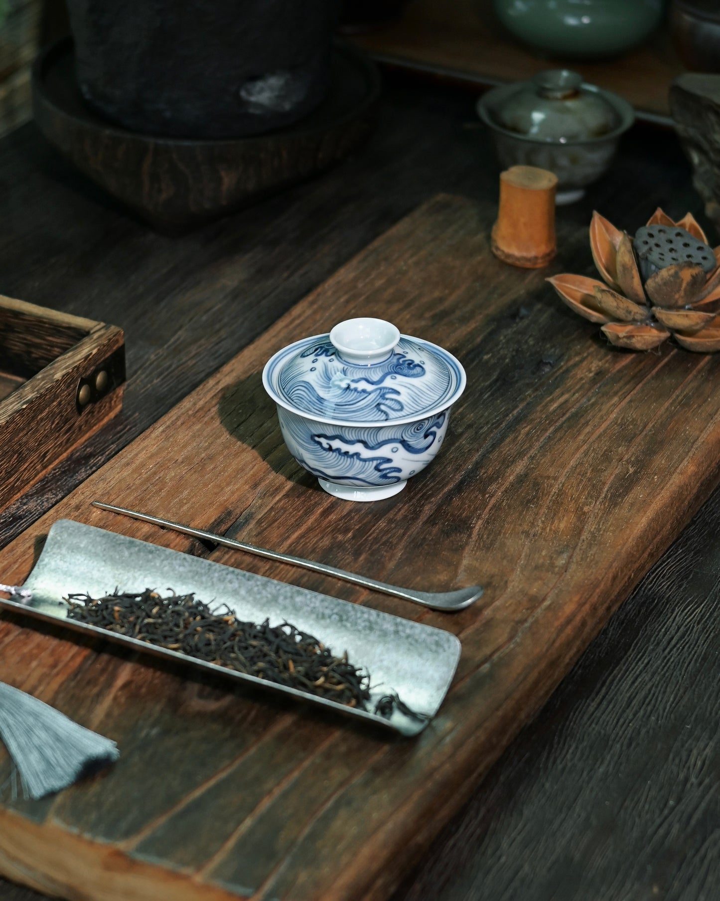 Cobalt blue wave motif symbolizing maritime spirit and natural power in Chinese art