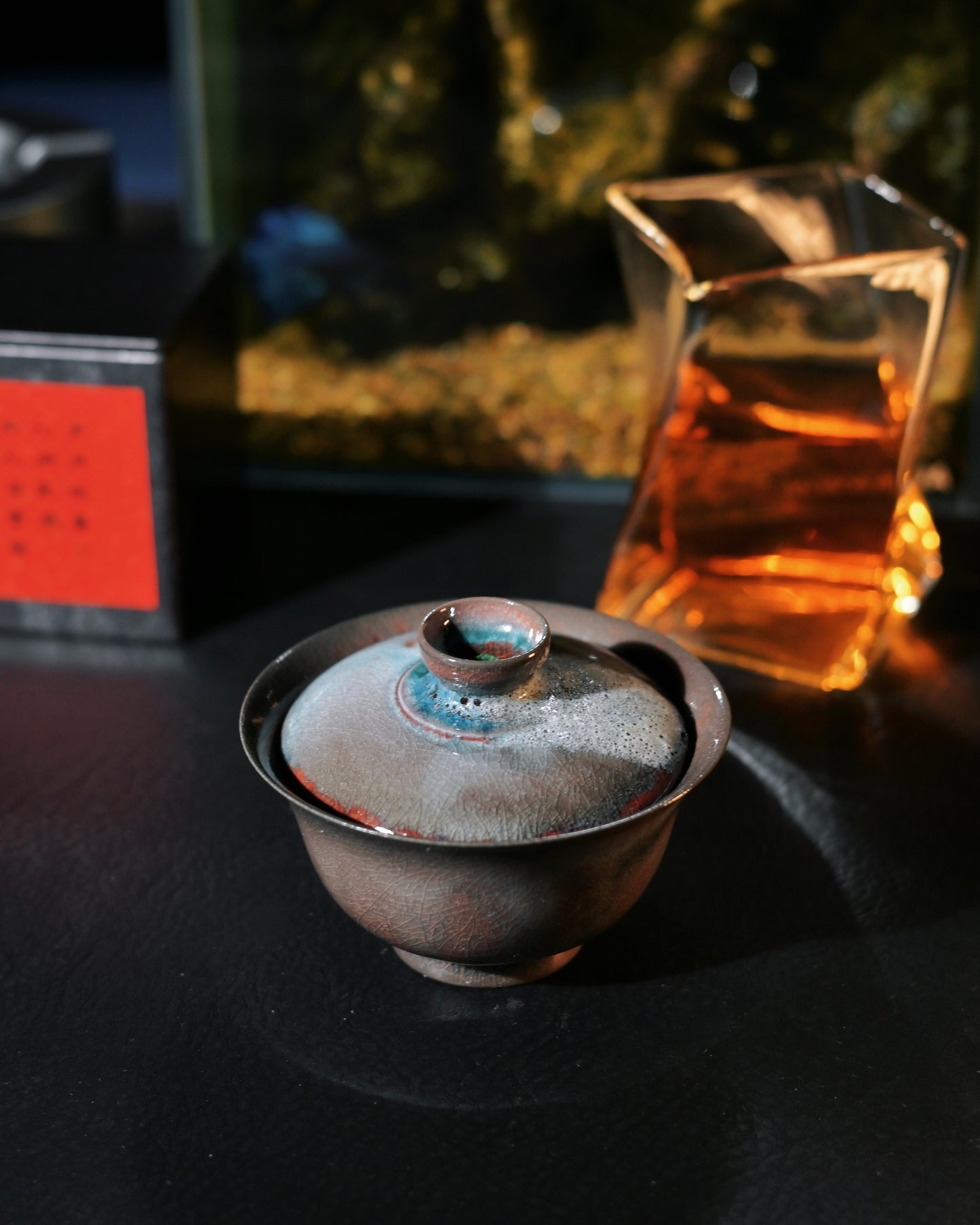 Jingdezhen ceramic gaiwan featuring galaxy-inspired glaze with shimmering crystals and wood-fired characteristics