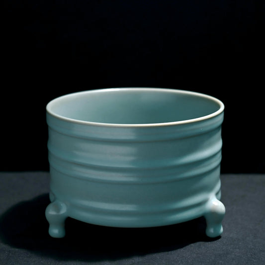 Ru ware tripod Zun vessel with string patterns and sky-blue glaze, Han Dynasty bronze-inspired design