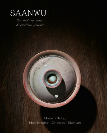 Macro detail of SAANWU soda-firing gaiwan knob, mottled cyan and rust crystal glaze, vintage crackle texture