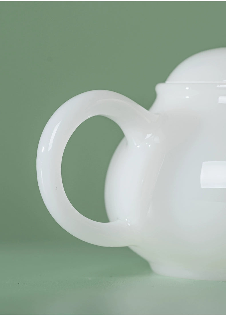 Glossy white porcelain teapot crafted in classic Xishi form