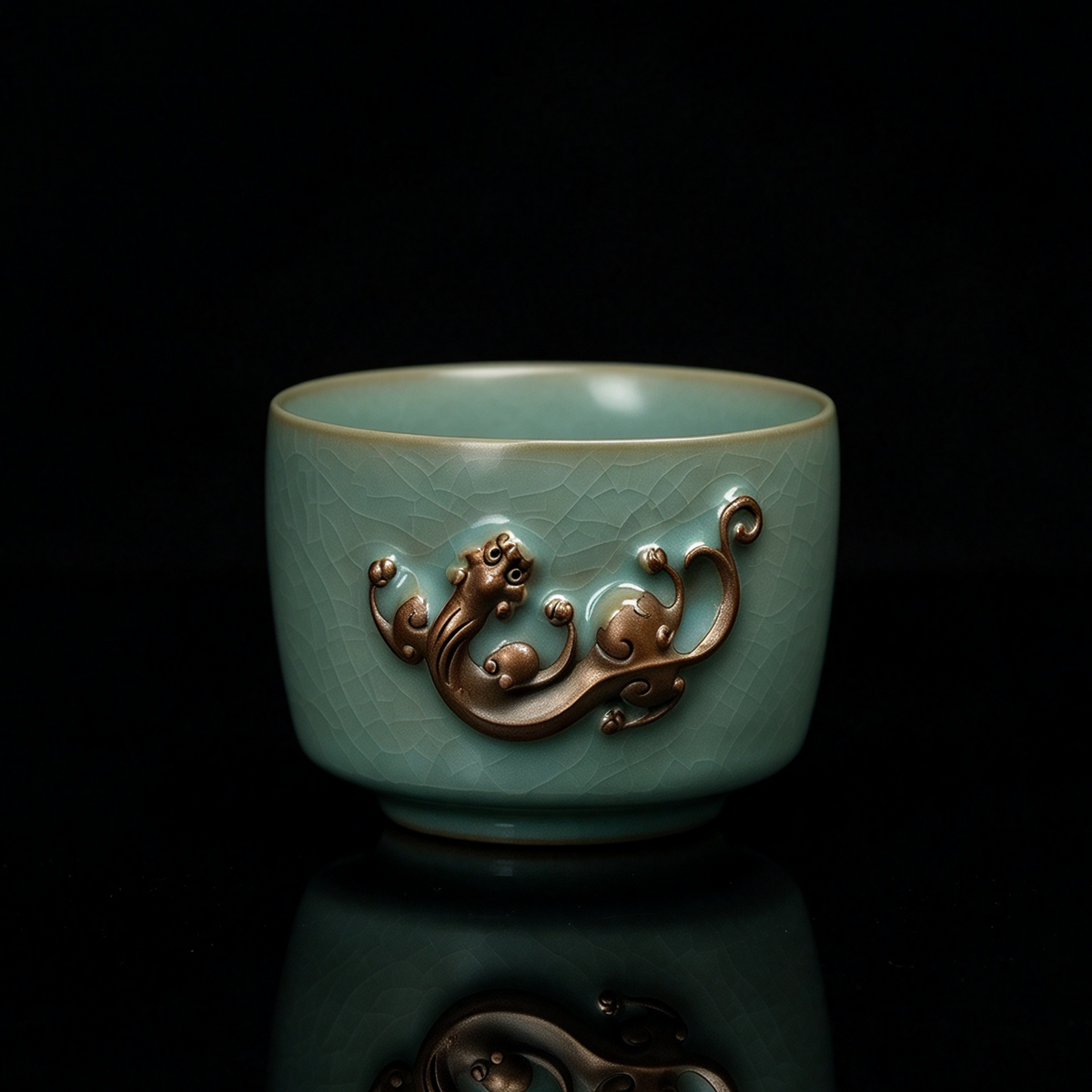 Ru Ware sky-blue glazed Chi dragon relief teacup 150ml resting on neutral fabric background
