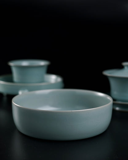 Five-pin fired Ru ware reproduction with full sky-blue glaze and flat base, mirroring rare Palace Museum artifact