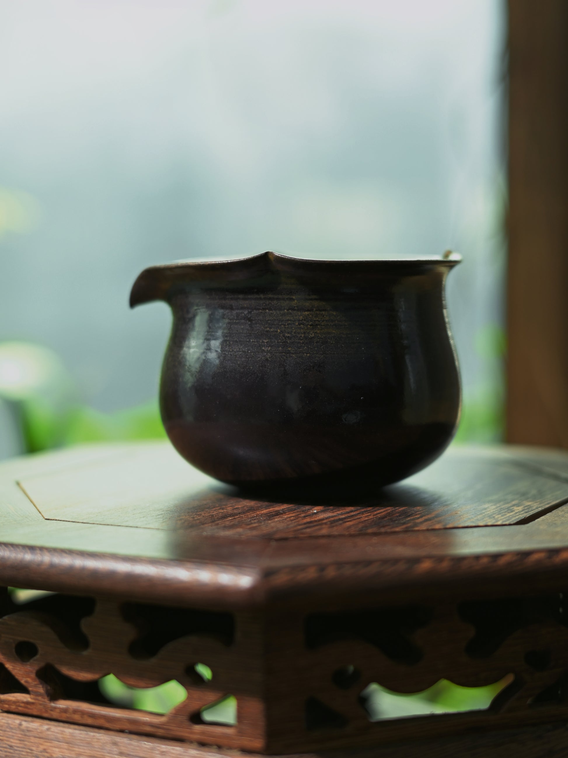 200ml capacity artisan fairness cup with flared rim and non-drip spout for Gongfu tea.