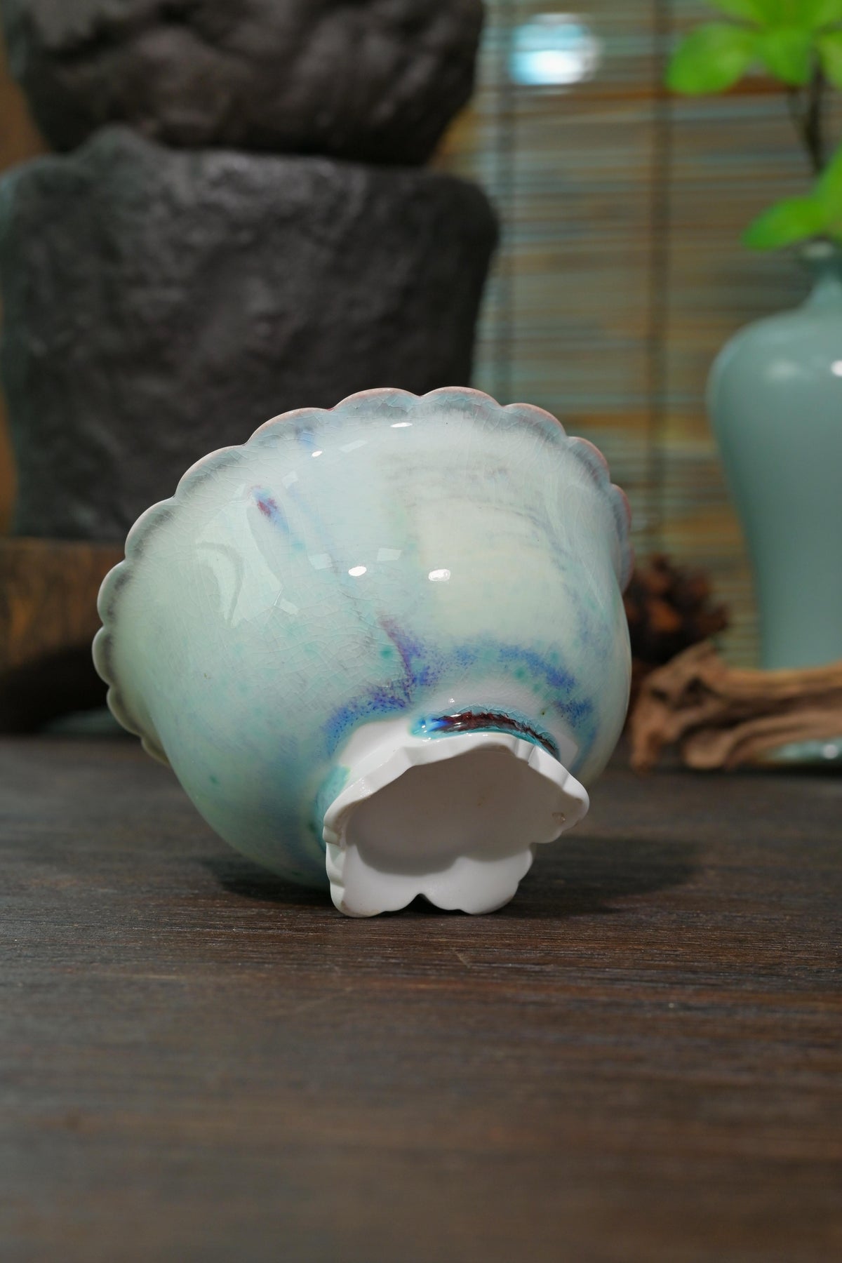 Chashao wood-fired gaiwan displaying soft azure glaze with natural flame-flushed violet accents