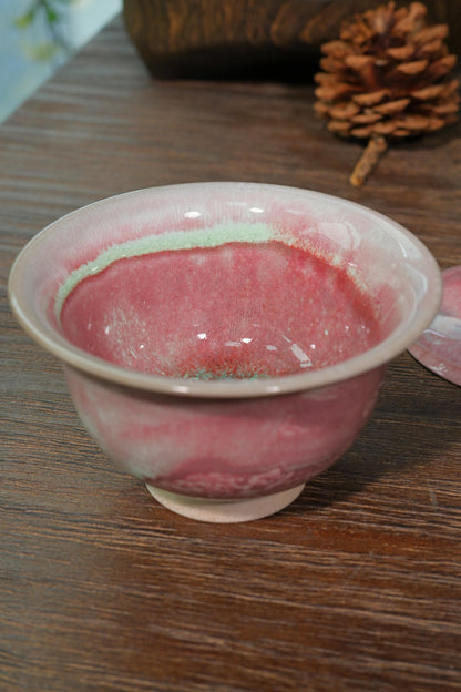 Traditional Chinese wood-fired gaiwan with crimson glaze splashes for Gongfu tea brewing