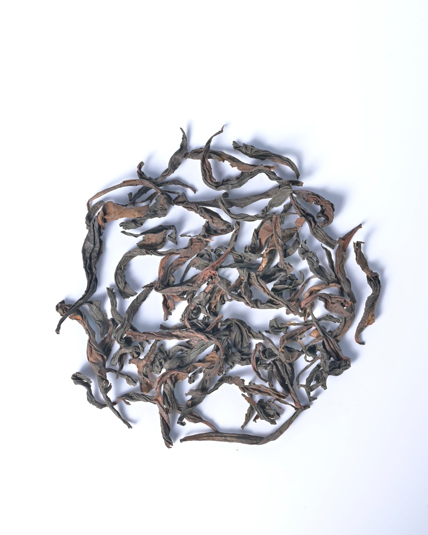 Loose-leaf Da Hong Pao Oolong Tea from 2025 spring harvest, featuring deep mineral notes and floral fragrance.