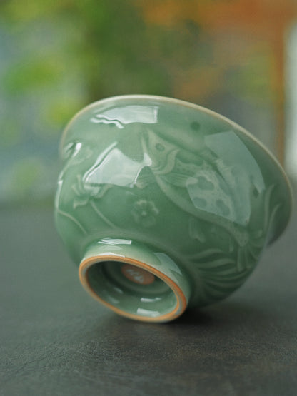 Longquan Celadon Plum-Green Relief-Carved Flowers Press Hand Teacup