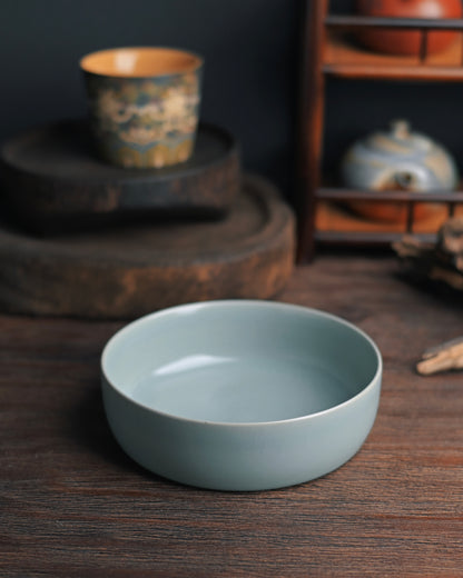 Northern Song-style Ru ware bowl replica with thin walls and thick base, showcasing classic celadon coloration