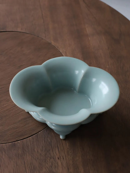 Ru Ware sky blue foliated tray set on dark wood table holding fresh fruits during Gongfu tea setup