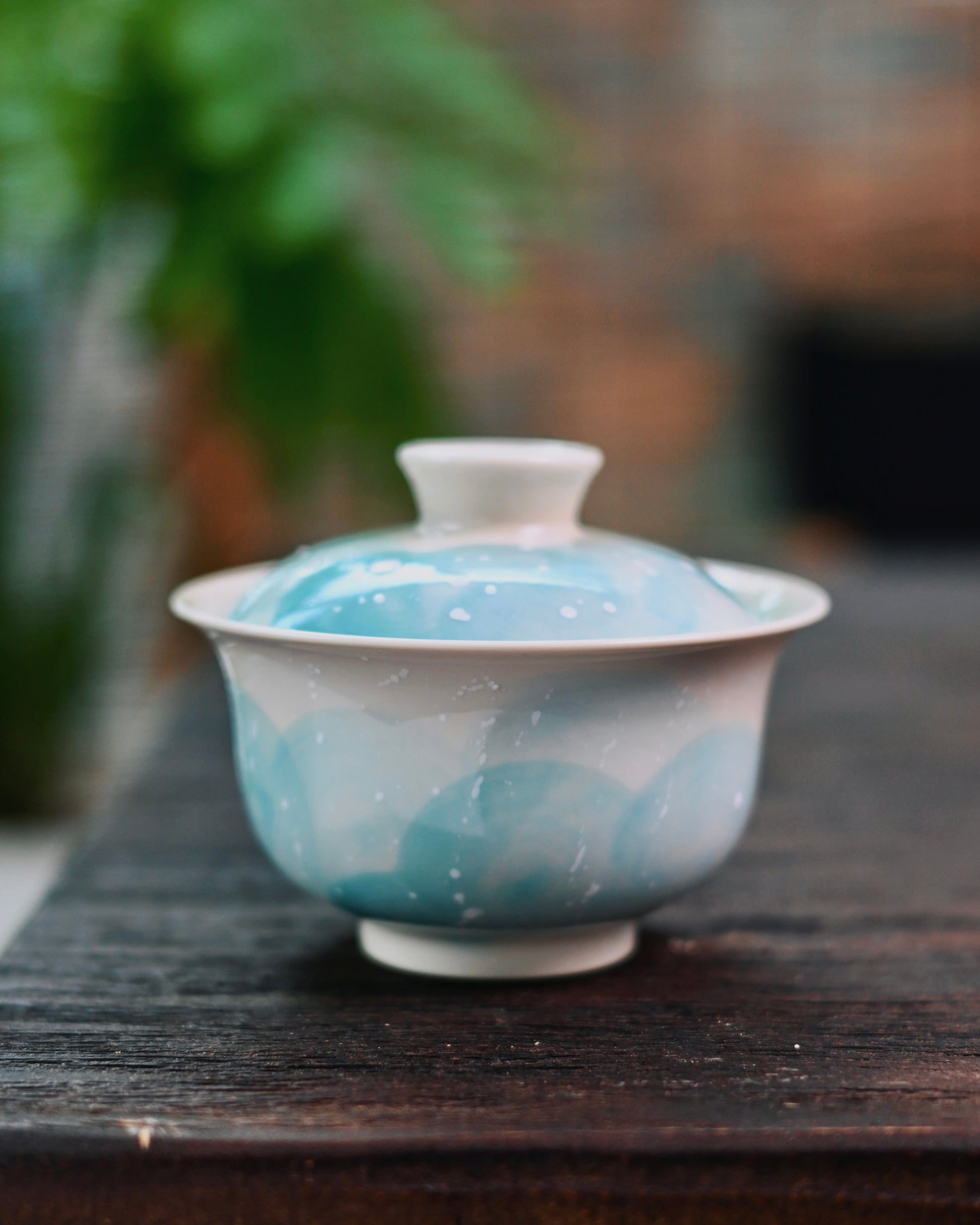 Saanwu-studio-granular snowflake texture creating tactile contrast against smooth glaze surface