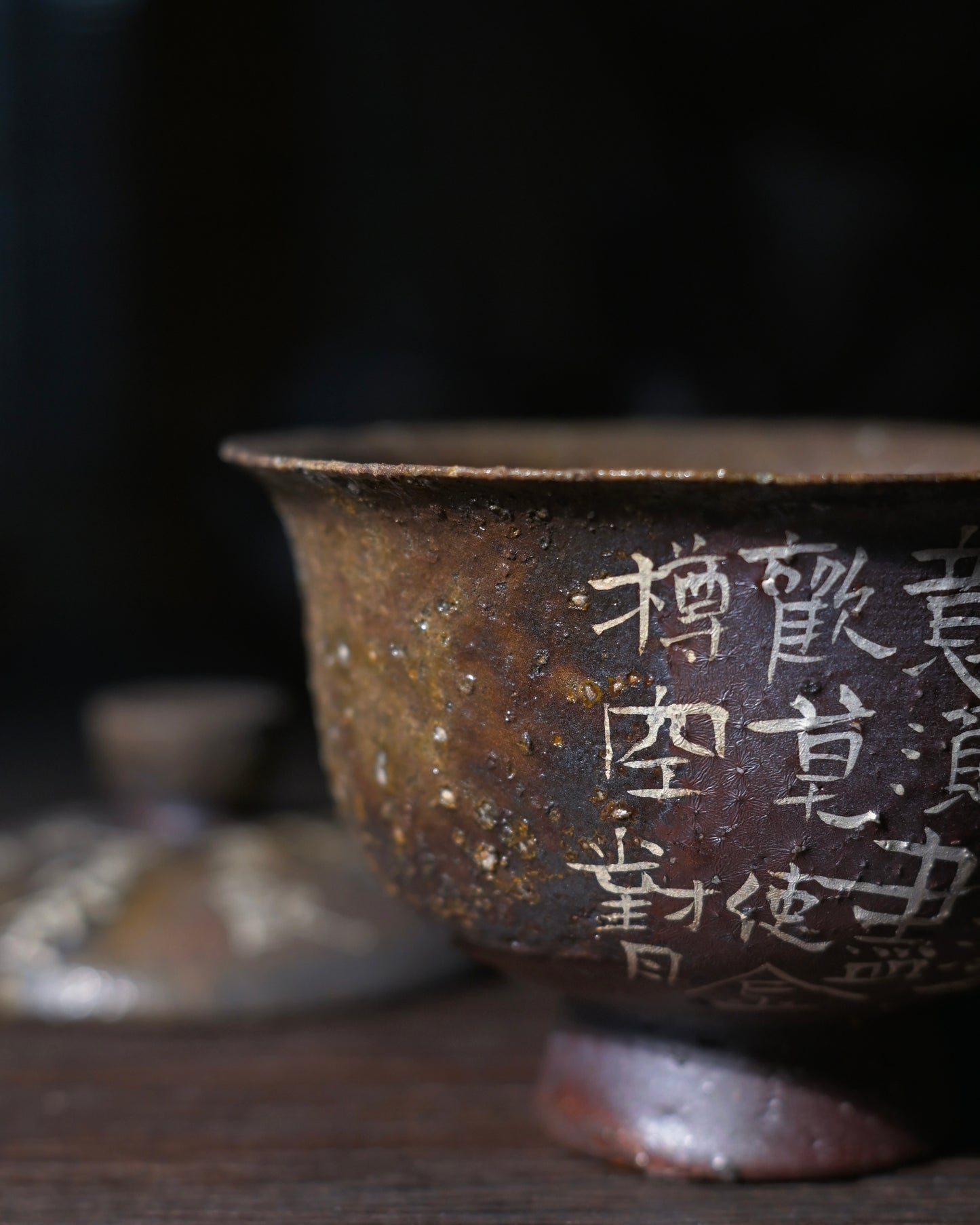 Granular textured Chinese teaware with visible mineral particles and throwing ridges preserved, not smoothed