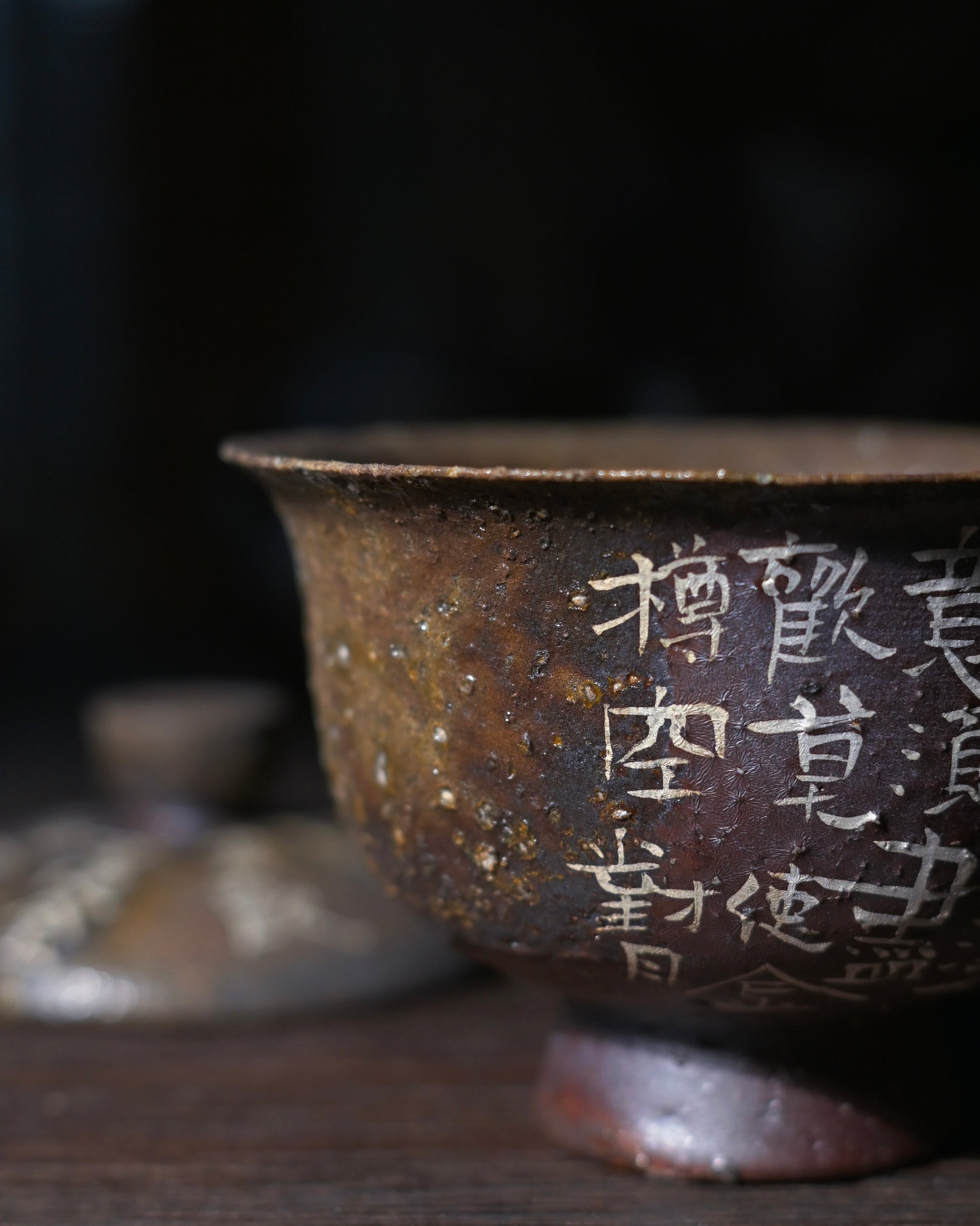 Granular textured Chinese teaware with visible mineral particles and throwing ridges preserved, not smoothed
