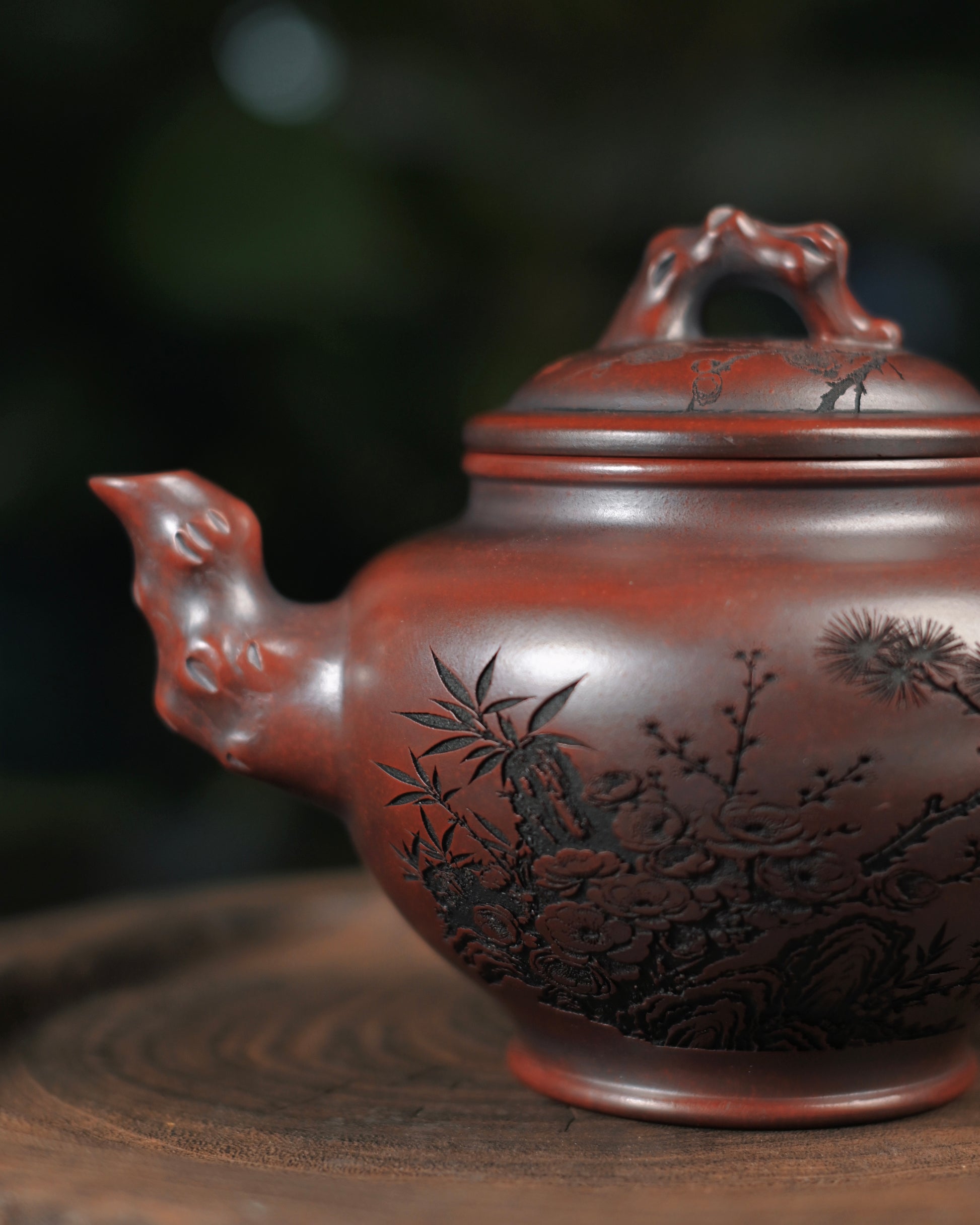 Hand-carved pine, plum and bamboo motifs representing resilience, purity and integrity in Chinese culture