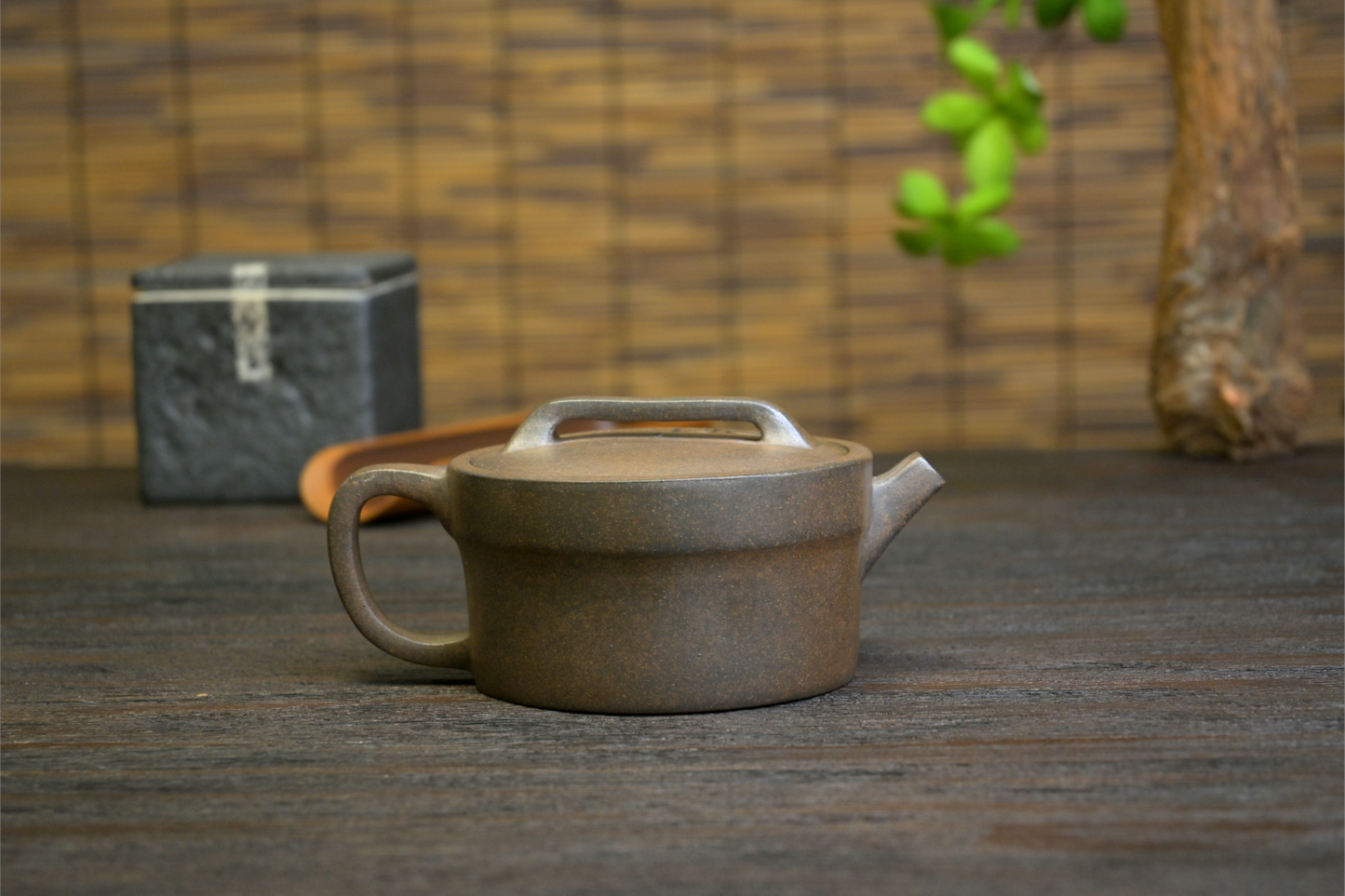 Hand-engraved vintage pattern Yixing teapot with unique designs, showcasing expert carving techniques on purple clay