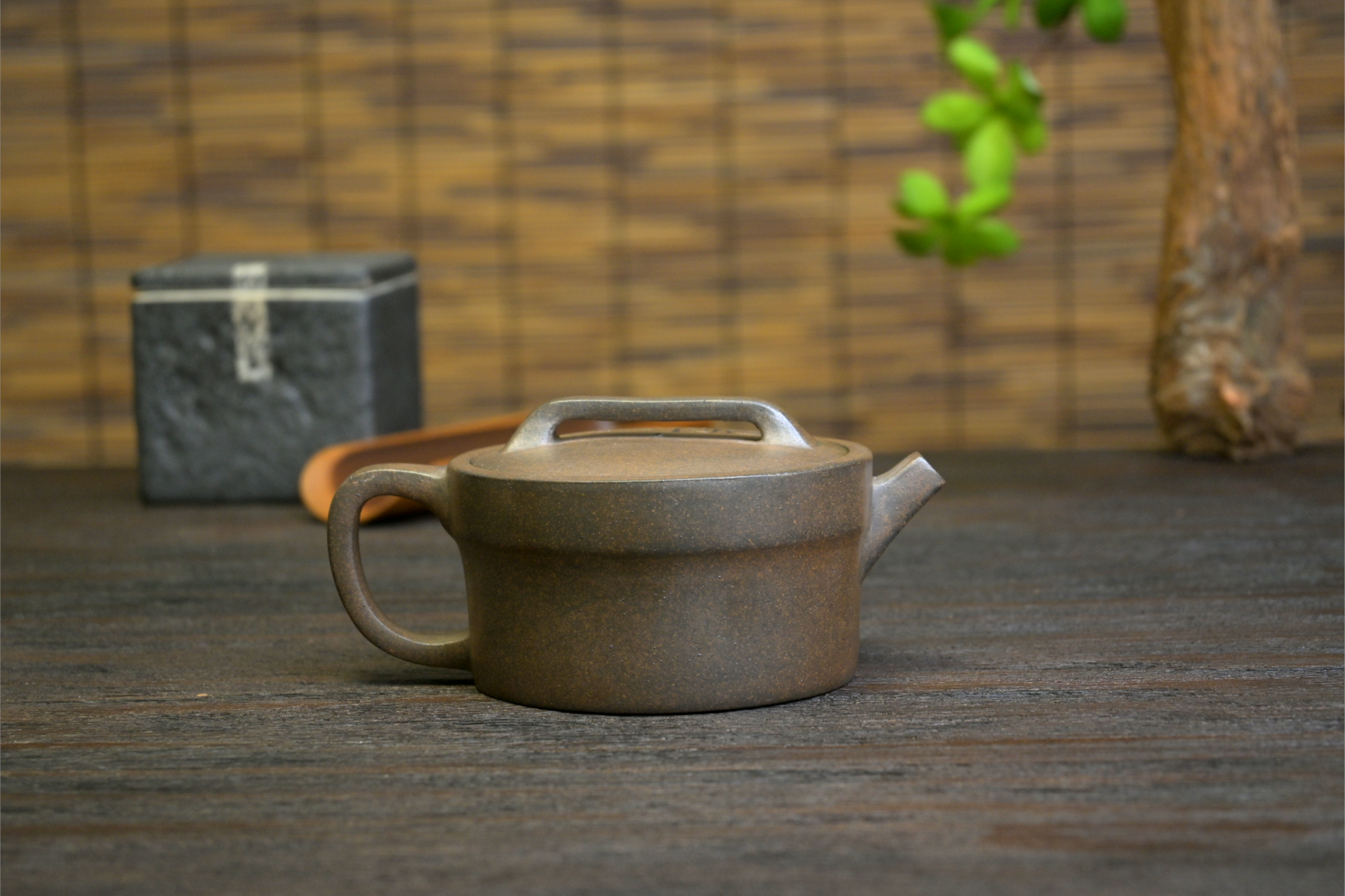 Hand-engraved vintage pattern Yixing teapot with unique designs, showcasing expert carving techniques on purple clay
