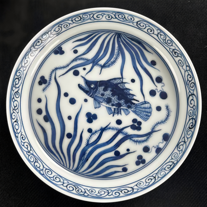Disassembled view showing the three components of the gaiwan: lid, bowl, and saucer.