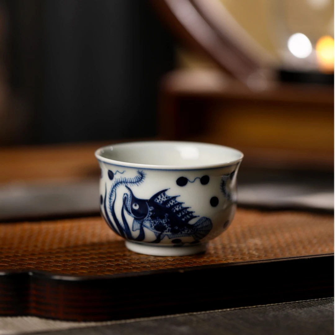 Hand-Painted Blue and White Porcelain Gaiwan set on a wooden tea tray for a Gongfu tea session.