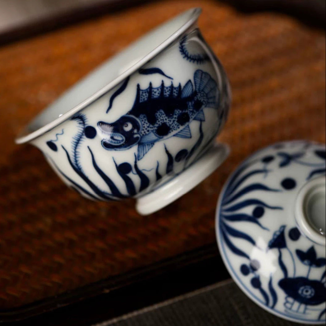 Side angle view highlighting the elegant curve and silhouette of the handcrafted porcelain gaiwan.