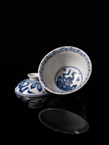Top-down view showing the smooth porcelain interior and flared rim of the wood-fired gaiwan.