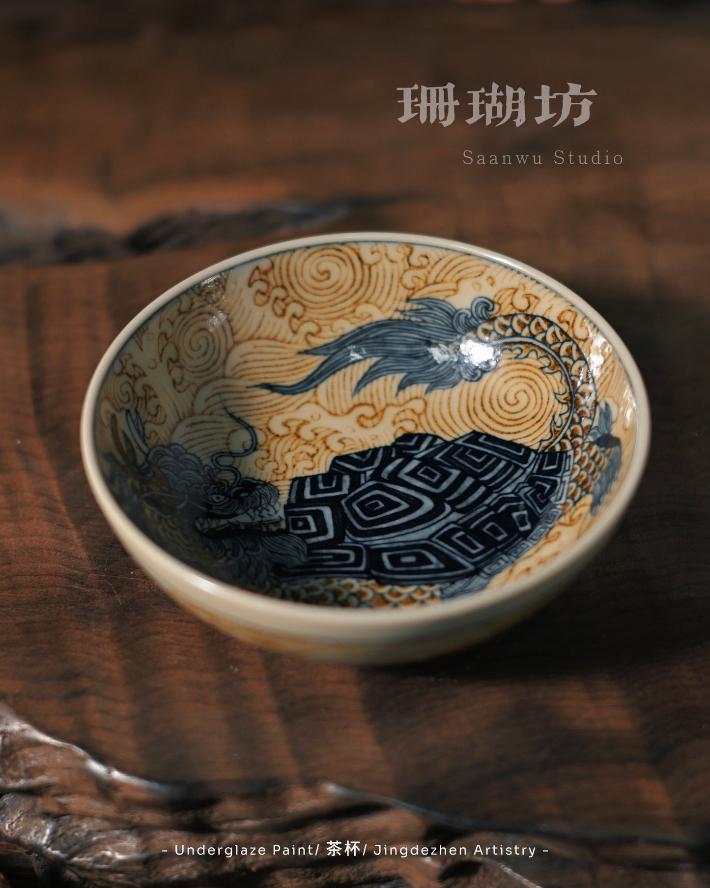 Interior dragon-turtle design hand-painted in rare golden cobalt beneath protective transparent glaze
