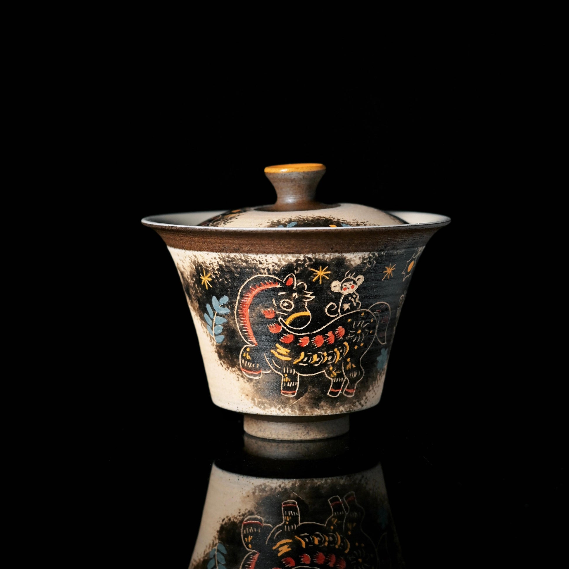 Hand-thown ceramic tea bowl demonstrating traditional Jingdezhen forming technique with integrated lid