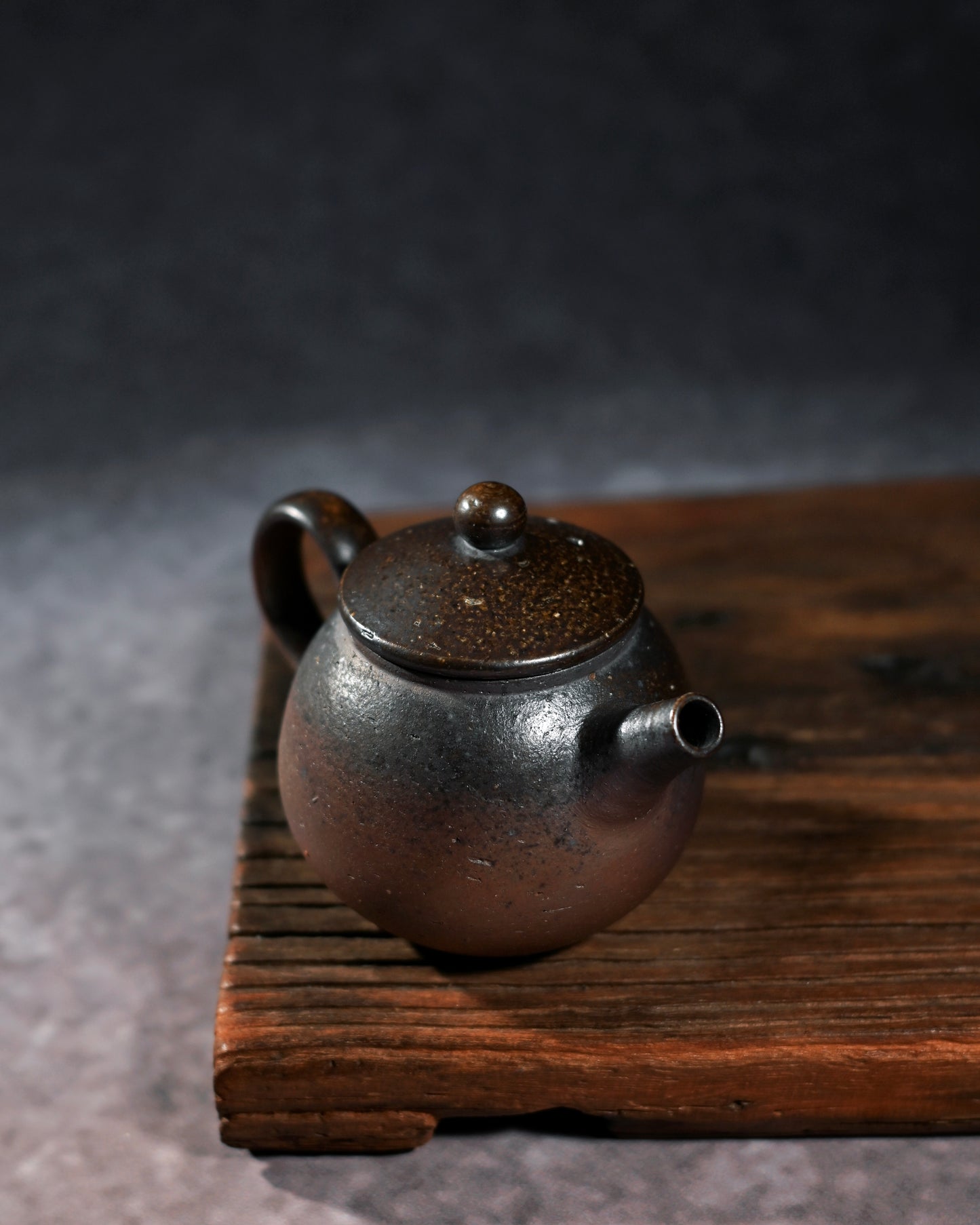 Hand-thrown ash-glaze pottery with organic texture from traditional pine wood kiln firing