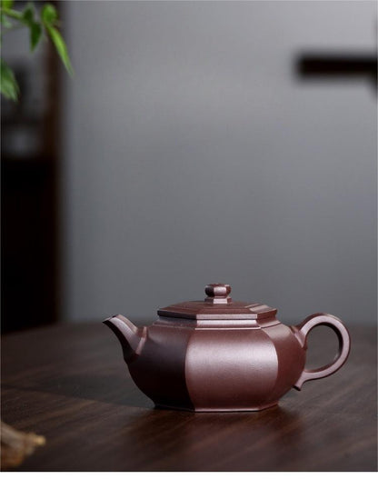 Yixing Zisha clay hexagonal Gongfu teapot with 320ml capacity, handmade from original ore clay