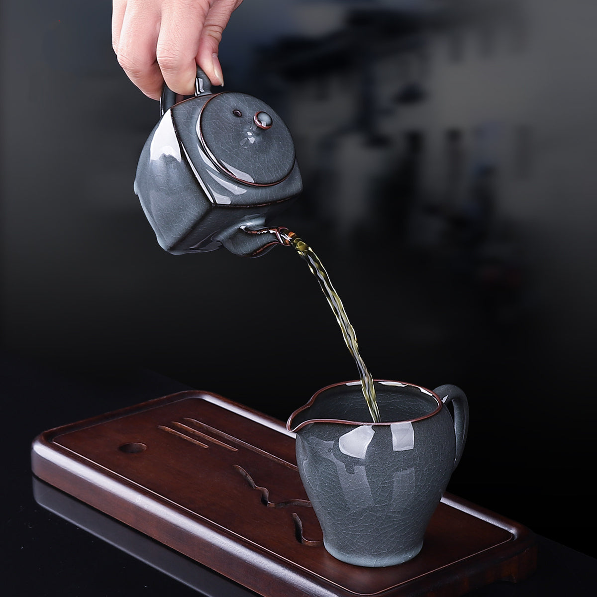 Precision square handle and elevated four-corner base on Ge Kiln crackle teapot