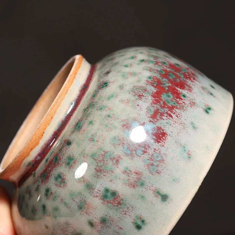 Bottom view of handcrafted Jun Ware Luohan cup, featuring unglazed foot ring and artisan craftsmanship.