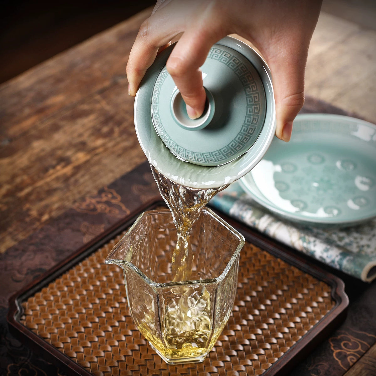 Ergonomic wide-flared celadon gaiwan rim designed for heat safety and smooth Gongfu tea pouring