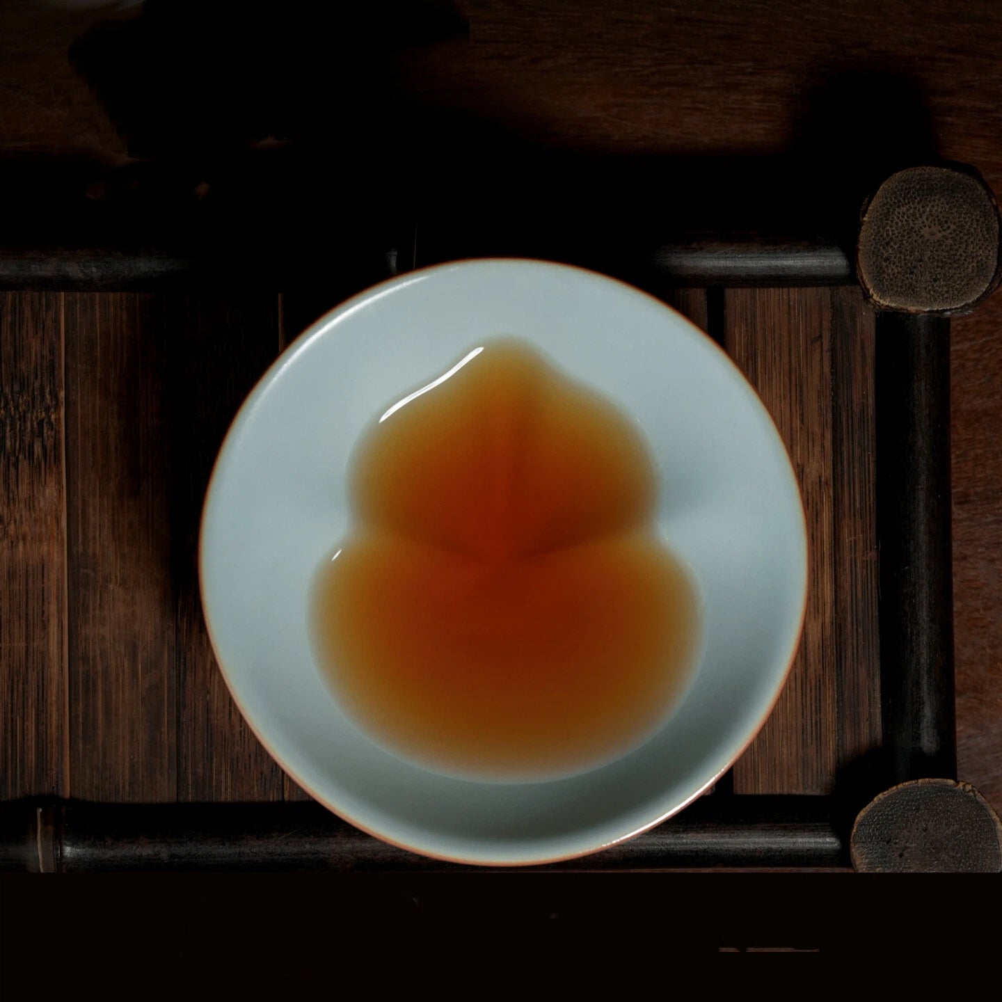 Song dynasty–inspired Ru kiln teacup with soft crackle glaze, designed to enhance aroma and tea clarity.